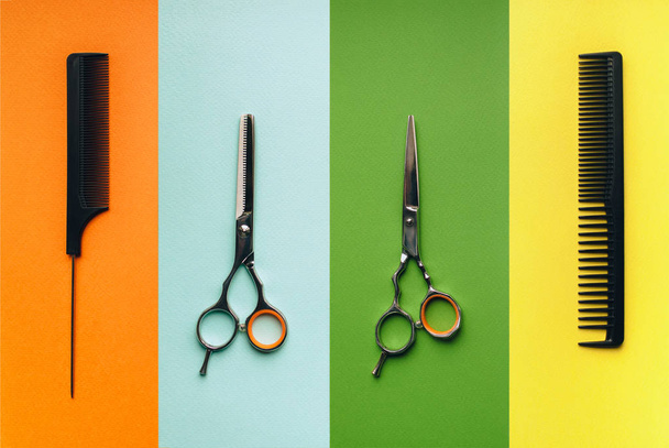 Barbershop. Tools hairdresser on the background of pastel paper in the form of multi-colored stripes. Minimalist pop art concept. - Fotografie, Obrázek