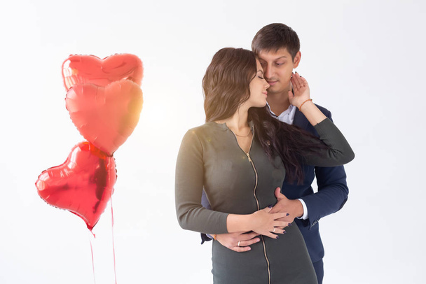 Young couple on Valentines Day on white background - Photo, Image