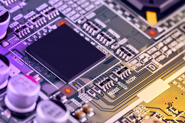 Electronic circuit board with electronic components such as chips close up. The concept of the electronic computer hardware technology. - Φωτογραφία, εικόνα