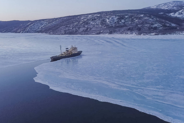 Ice-enpalled naldo, ice breaking ship. - Photo, Image