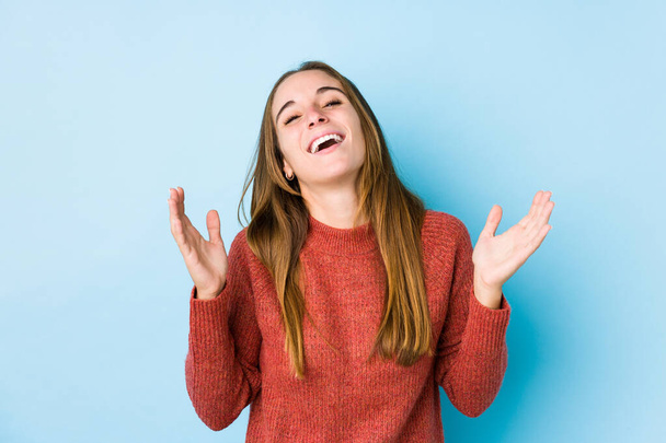Young caucasian woman posing isolated  joyful laughing a lot. Happiness concept. - Φωτογραφία, εικόνα