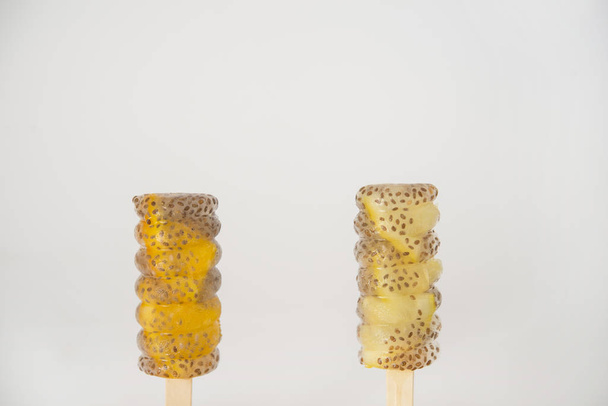 Popsicle of orange and lemon with chia - Zdjęcie, obraz