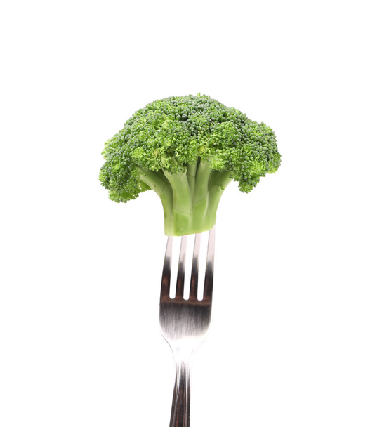 Broccoli impaled on a fork. - Foto, afbeelding