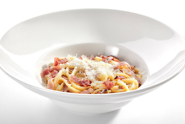 Macro Photo of Spaghetti Carbonara with Grated Parmesan and Baco - Photo, image
