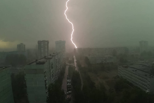 Lightning during thunderstorm in the sky. Natural phenomenon of - Photo, Image