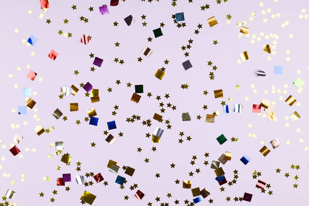 Holiday background with multicolored confetti. - Photo, Image