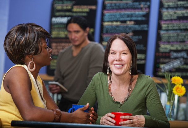 Dos clientes felices Café
 - Foto, imagen