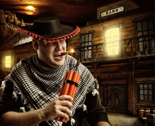 Cowboy sério mexicano disparando dinamite por charuto
 - Foto, Imagem