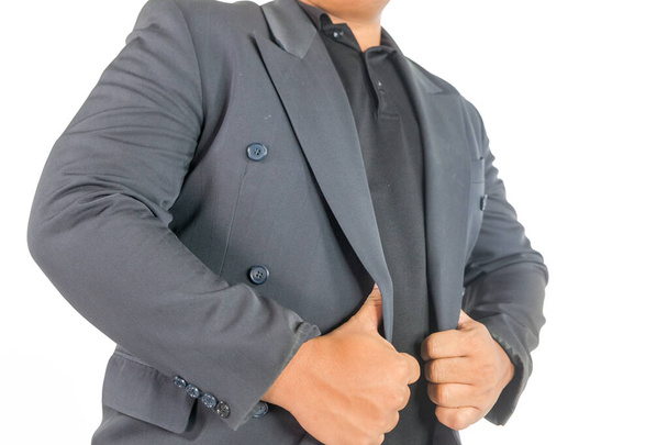 Business man touching a suit on white background - Fotó, kép