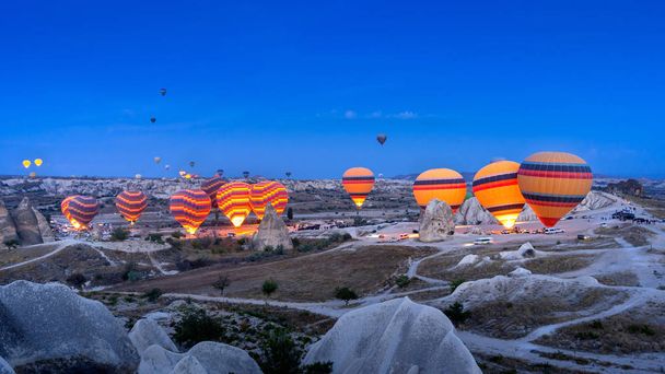 Vibrant colorful hot air balloons in Cappadocia, Turkey. - Foto, afbeelding