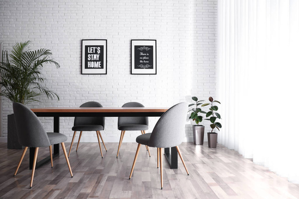 Modern dining room interior with stylish furniture - Foto, Bild