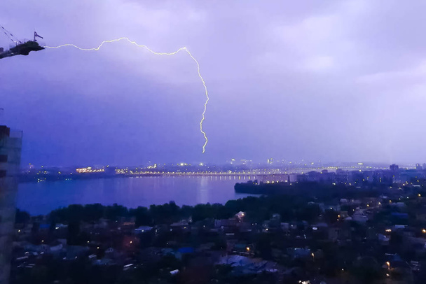 Lightning during thunderstorm in the sky. Natural phenomenon of - Photo, Image