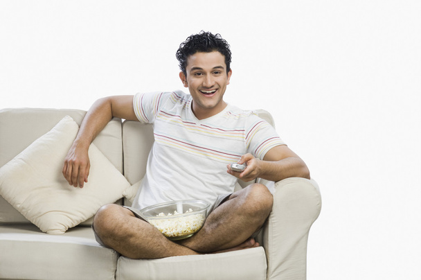Man watching television - Fotó, kép