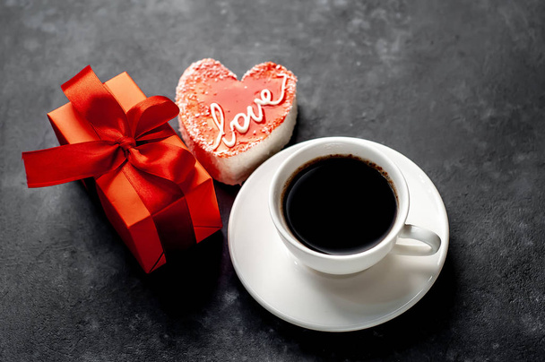 Coffee served with red heart cake and gift box - Valentines day - Photo, image