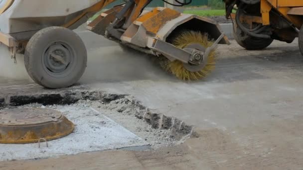 Street cleaning machine prepare rod before repair with new asphalt. - Footage, Video