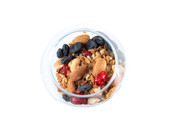 Mix of dried fruits and nuts. Mix of nuts in a glass. - Photo, Image