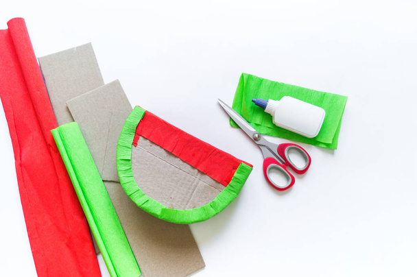 Craft diy pinata from paper and cardboard watermelon. - Фото, зображення