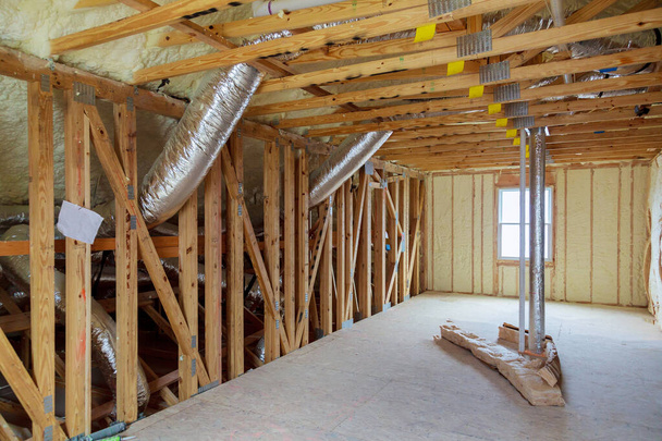 Insulation of thermal insulation attic with cold barrier and insulation material - Photo, Image