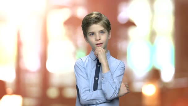 Cute caucasian boy with thoughtful expression. - Footage, Video