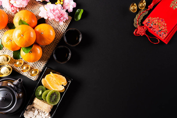Chiński Nowy Rok dekoracje festiwalowe pow lub czerwony pakiet, pomarańczowy  - Zdjęcie, obraz