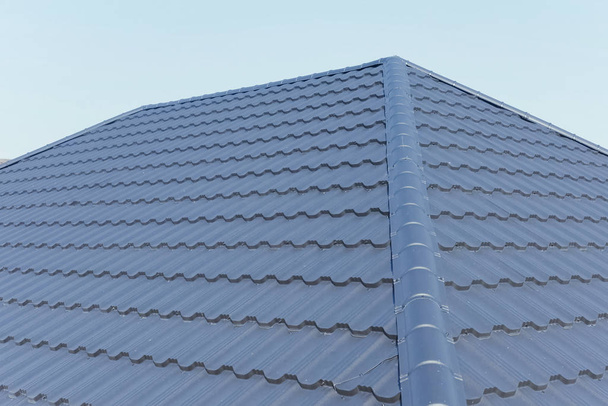 Corrugated metal roof and metal roofing. Modern roof made of met - Photo, Image