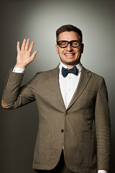 Nerd in eyeglasses and bow tie says Hello - Фото, зображення