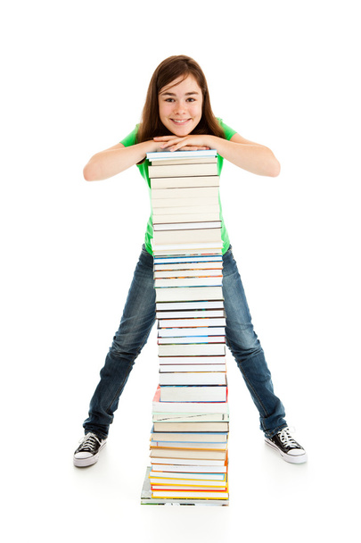 Student standing near the books - Photo, image
