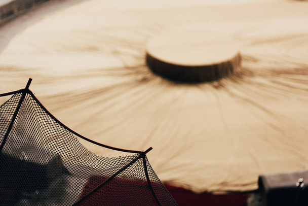 Selective focus of net and covered circus arena  - Zdjęcie, obraz