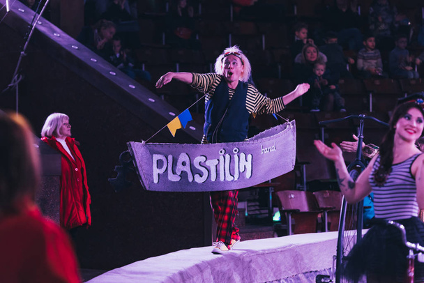 KYIV, UKRAINE - NOVEMBER 1, 2019:  Selective focus of artists with props performing at circus stage - 写真・画像