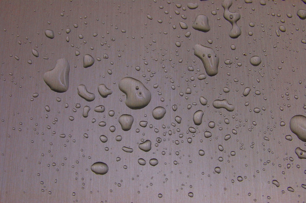 Капли воды на металлической поверхности - Фото, изображение