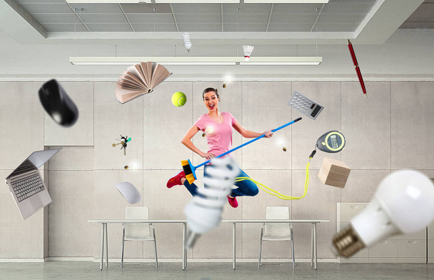 Woman doing funny cleaning. Mixed media - Foto, immagini