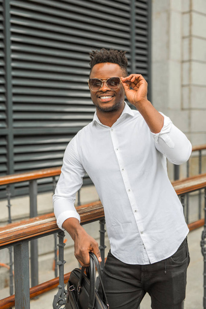 handsome young african man in a white shirt - Photo, Image