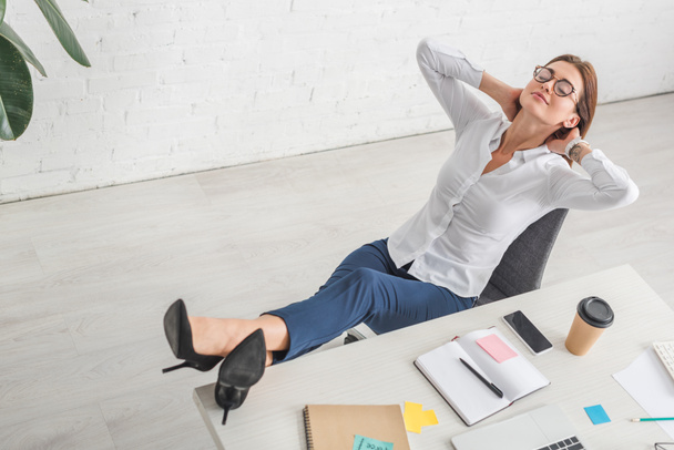 beautiful businesswoman in glasses chilling in office  - Photo, Image