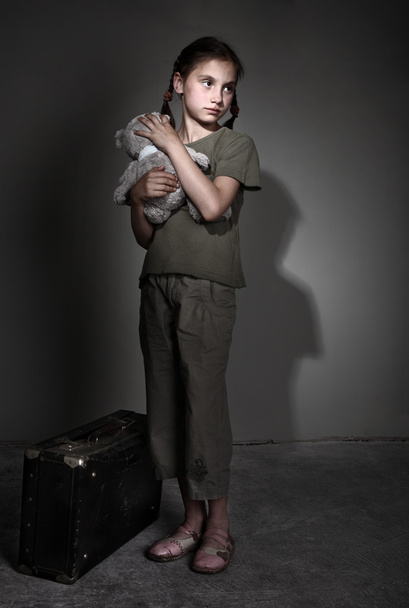 Little lonely girl with suitcase - Φωτογραφία, εικόνα