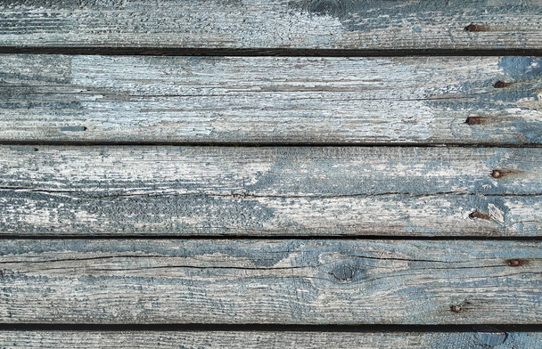 Wooden background consisting of old gray, unpolished boards. The texture of the cut pine. - Foto, immagini
