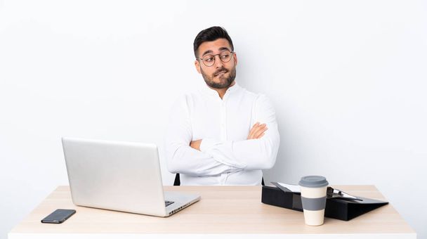 Young businessman in a workplace with confuse face expression - Photo, Image