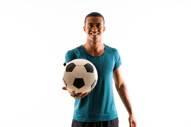 Afro American piłkarz człowiek na białym tle biały - Zdjęcie, obraz