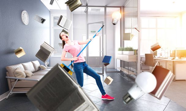 Woman doing funny cleaning. Mixed media - Valokuva, kuva