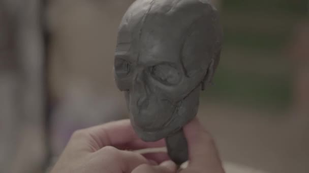 Man male sculptor is working on the creation of sculpture. Kyiv. Ukraine. - Záběry, video