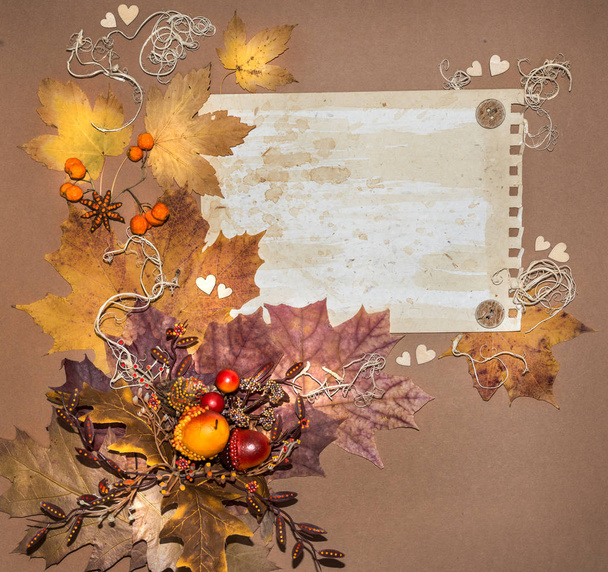 Paper frame decorated with autumn decorations - Φωτογραφία, εικόνα