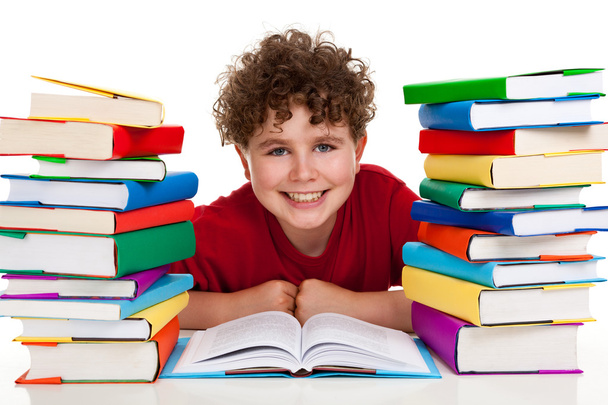 Student with pile of books - Photo, image