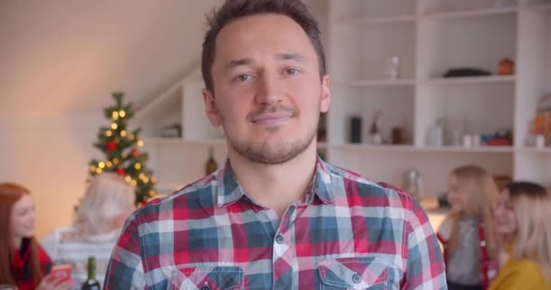 Close-up portrait of a young man new year christmas family evening - Filmmaterial, Video