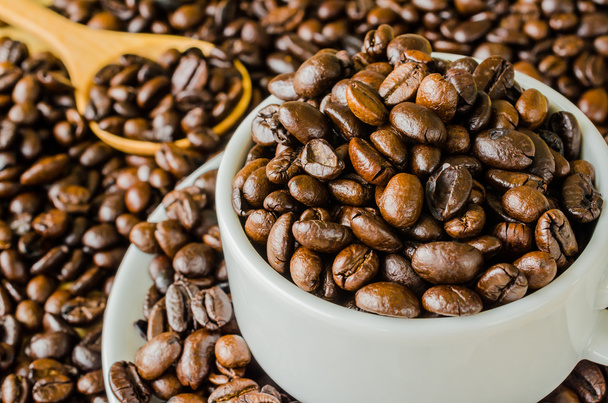 Coffee beans on cup - Photo, Image