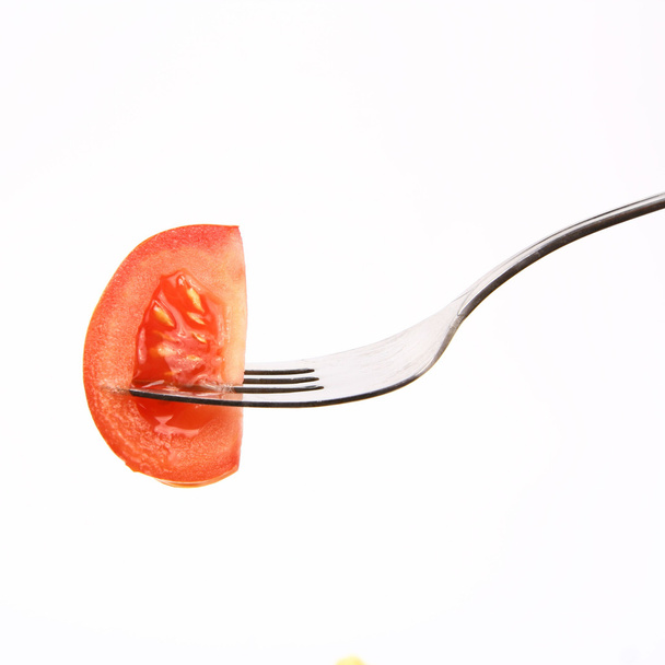 Tomato on fork - Φωτογραφία, εικόνα