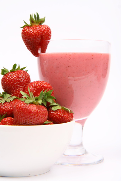 Strawberries in a bowl and a strawberry shake - Valokuva, kuva