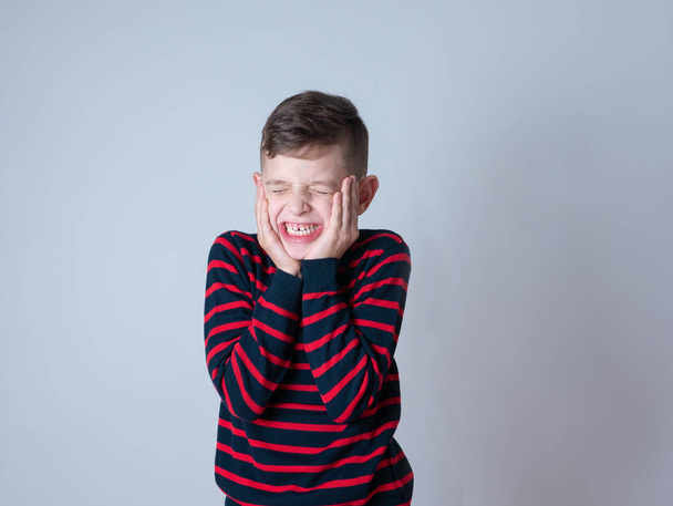young boy putting funny faces - Foto, immagini