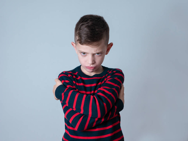 young boy looking upset and angry - Foto, Bild