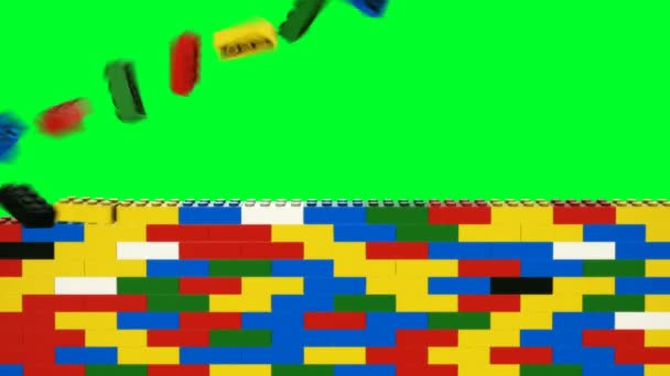 レンガの壁の遷移、クロママットは、プラスチックレゴのようなレンガから構築された壁でのショットとの間のワイプ遷移が含まれています。緑色のクロマキーの背景を簡単に追加のマットに置き換えることができます。3Dレンダリングフル4k. - 映像、動画