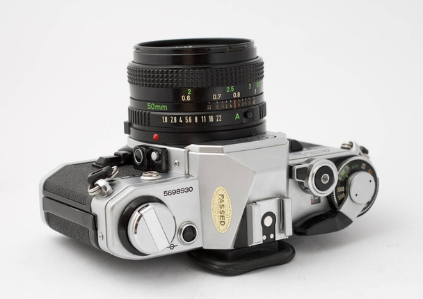 Classic analog single-lens reflex camera isolated on white background - Fotoğraf, Görsel