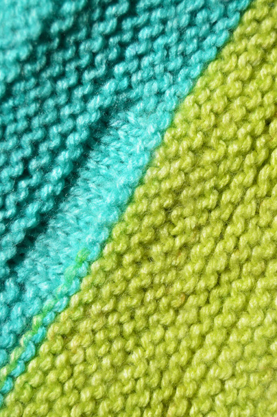 Tejido de punto hecho a mano de color turquesa y lana verde texto de fondo
 - Foto, Imagen